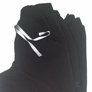 Figs scrub pants high waisted. Just want a different size. New. I have about 4